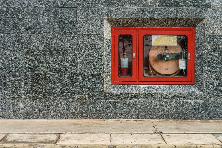 Fire Hose Outside Building Wall 1